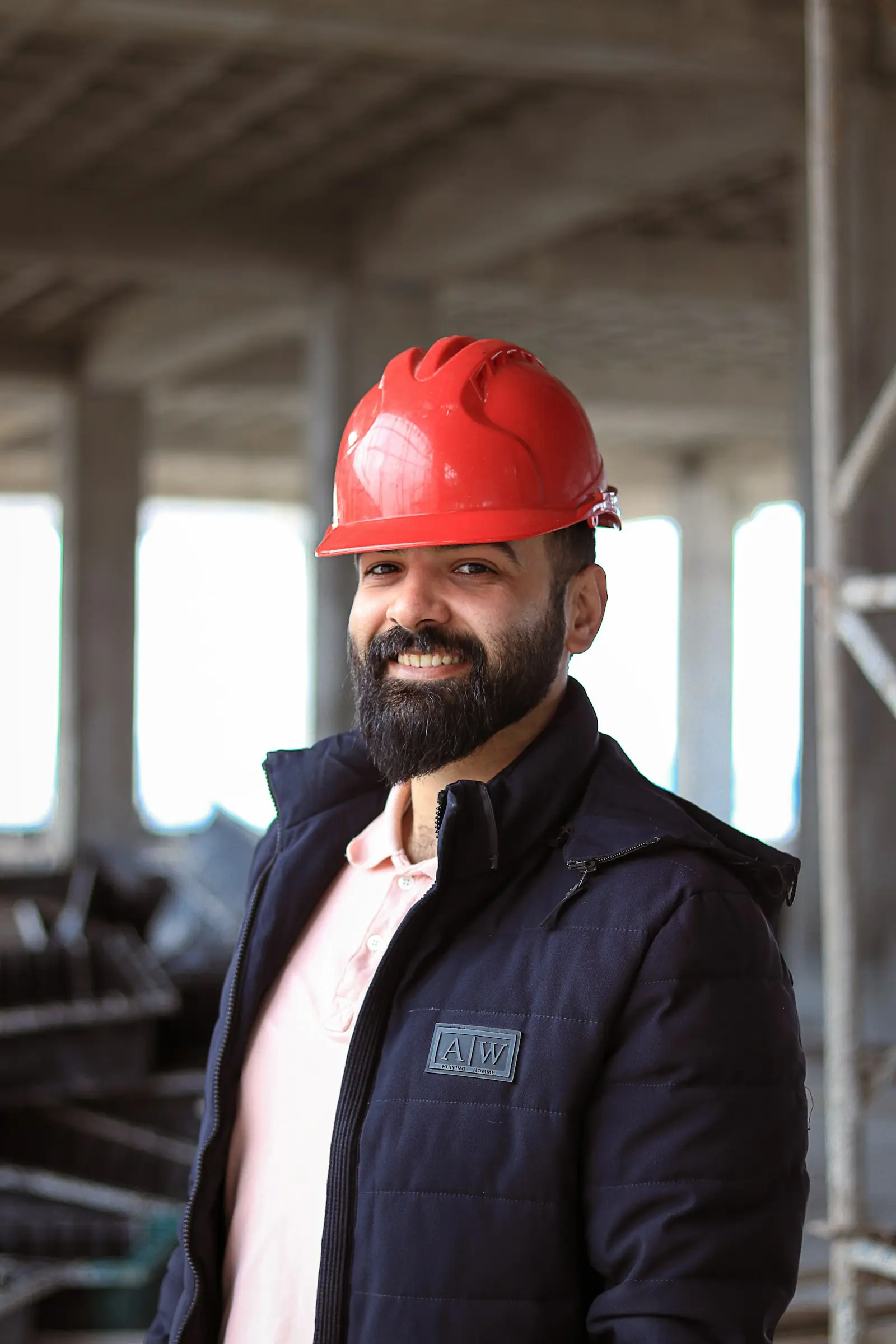 Marco Salas, Hartline senior project manager, on a job site