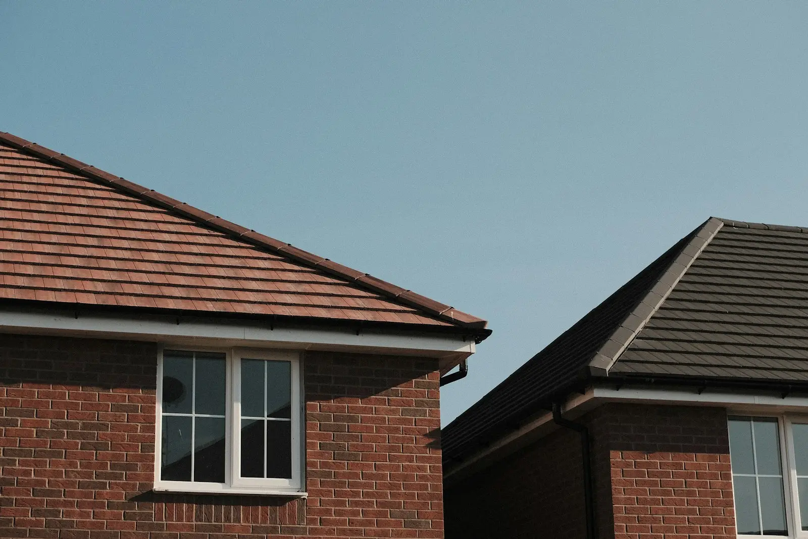 Brick home eaves with new fascia, drip edge and gutter